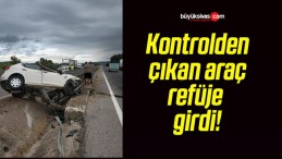 Kontrolden çıkan araç refüje girdi!