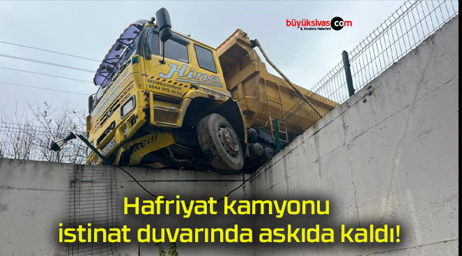 Hafriyat kamyonu istinat duvarında askıda kaldı!