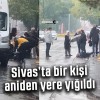 Sivas bir kişi aniden yere yığıldı! Başında şemsiyelerle beklediler