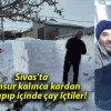 Sivas’ta mahsur kalınca kardan ev yapıp içinde çay içtiler!