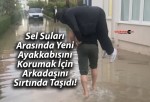 Sel Suları Arasında Yeni Ayakkabısını Korumak İçin Arkadaşını Sırtında Taşıdı!