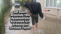 Sel Suları Arasında Yeni Ayakkabısını Korumak İçin Arkadaşını Sırtında Taşıdı!