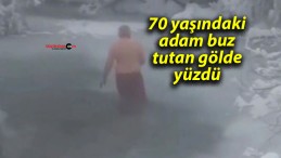 70 yaşındaki adam buz tutan gölde yüzdü