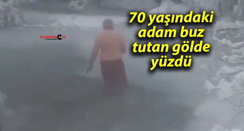 70 yaşındaki adam buz tutan gölde yüzdü