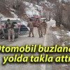 Otomobil buzlanan yolda takla attı